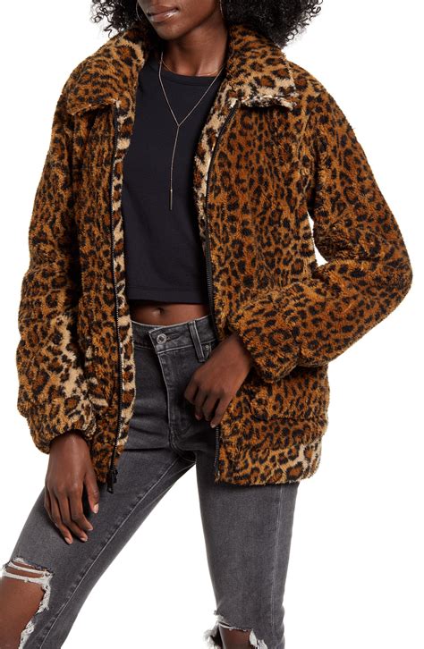 faux animal print coat|jumper with faux fur collar.